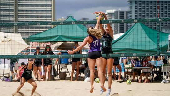 Sydney Miller battles at the net vs TCU during the 2025 OUTRIGGER Duke Kahanamoku Beach Classic. 