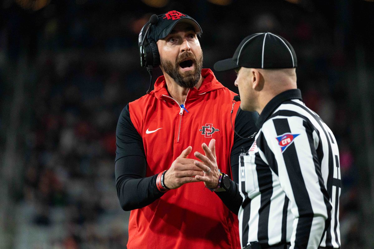 San Diego State Head Coach Sean Lewis calls timeout during an NCAA Football game between San Jose State and San Diego State, Saturday November 22, 2025 in San Diego, Calif. San Diego State Head Coach Sean Lewis calls timeout during an NCAA Football game between San Jose State and San Diego State, Saturday November 22, 2025 in San Diego, Calif.