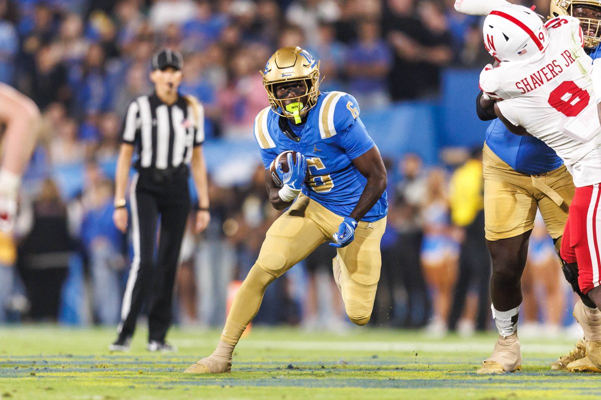 UCLA Bruins running back Anthony Woods (6) runs the ball during the game against Nebraska Cornhuskers at Rose Bowl Stadium on November 8, 2025 in Pasadena, California. UCLA Bruins running back Anthony Woods (6) runs the ball during the game against Nebraska Cornhuskers at Rose Bowl Stadium on November 8, 2025 in Pasadena, California.