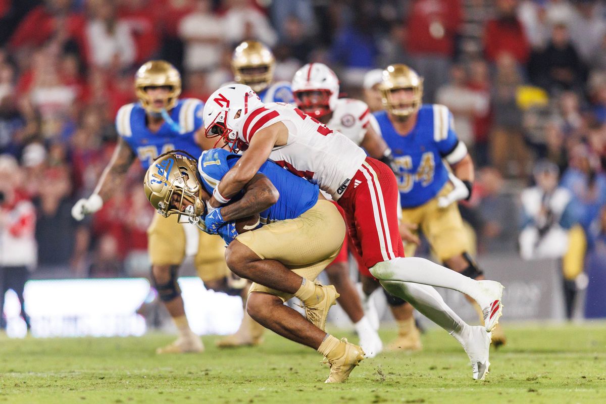 UCLA Bruins wide receiver Rico Flores Jr. (1) gets jumped on during the game against Nebraska Cornhuskers at Rose Bowl Stadium on November 8, 2025 in Pasadena, California. UCLA Bruins wide receiver Rico Flores Jr. (1) gets jumped on during the game against Nebraska Cornhuskers at Rose Bowl Stadium on November 8, 2025 in Pasadena, California.