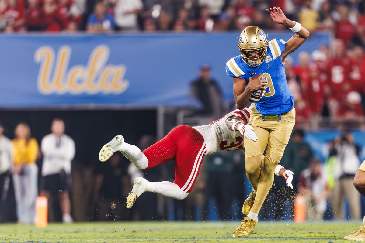 UCLA Bruins quarterback Nico Iamaleava (9) runs the ball during the game against Nebraska Cornhuskers at Rose Bowl Stadium on November 8, 2025 in Pasadena, California. UCLA Bruins quarterback Nico Iamaleava (9) runs the ball during the game against Nebraska Cornhuskers at Rose Bowl Stadium on November 8, 2025 in Pasadena, California.