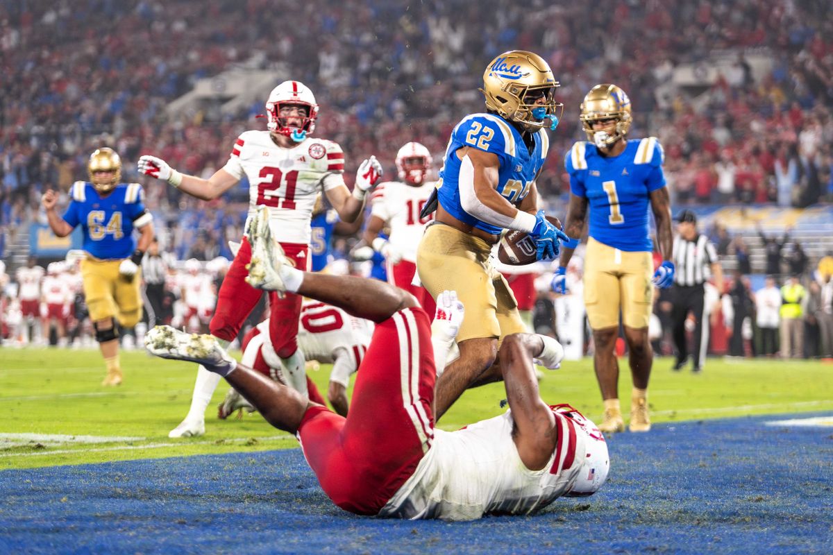 UCLA Bruins running back Anthony Frias II (22) runs in for a touchdown during the game against Nebraska Cornhuskers at Rose Bowl Stadium on November 8, 2025 in Pasadena, California. UCLA Bruins running back Anthony Frias II (22) runs in for a touchdown during the game against Nebraska Cornhuskers at Rose Bowl Stadium on November 8, 2025 in Pasadena, California.