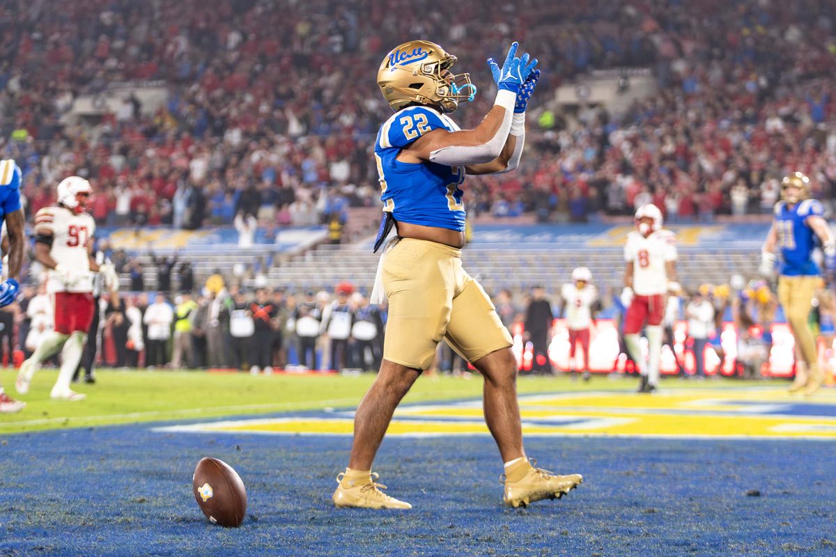 UCLA Bruins running back Anthony Frias II (22) celebrates a touchdown during the game against Nebraska Cornhuskers at Rose Bowl Stadium on November 8, 2025 in Pasadena, California. UCLA Bruins running back Anthony Frias II (22) celebrates a touchdown during the game against Nebraska Cornhuskers at Rose Bowl Stadium on November 8, 2025 in Pasadena, California.