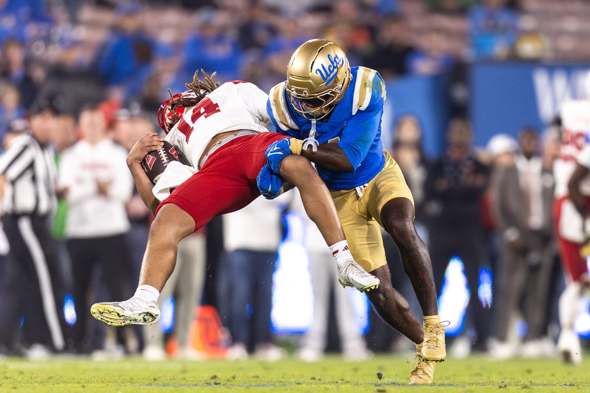UCLA Bruins defensive back Key Lawrence (4) sacks Nebraska Cornhuskers quarterback TJ Lateef (14) during the game against Nebraska Cornhuskers at Rose Bowl Stadium on November 8, 2025 in Pasadena, California. UCLA Bruins defensive back Key Lawrence (4) sacks Nebraska Cornhuskers quarterback TJ Lateef (14) during the game against Nebraska Cornhuskers at Rose Bowl Stadium on November 8, 2025 in Pasadena, California.