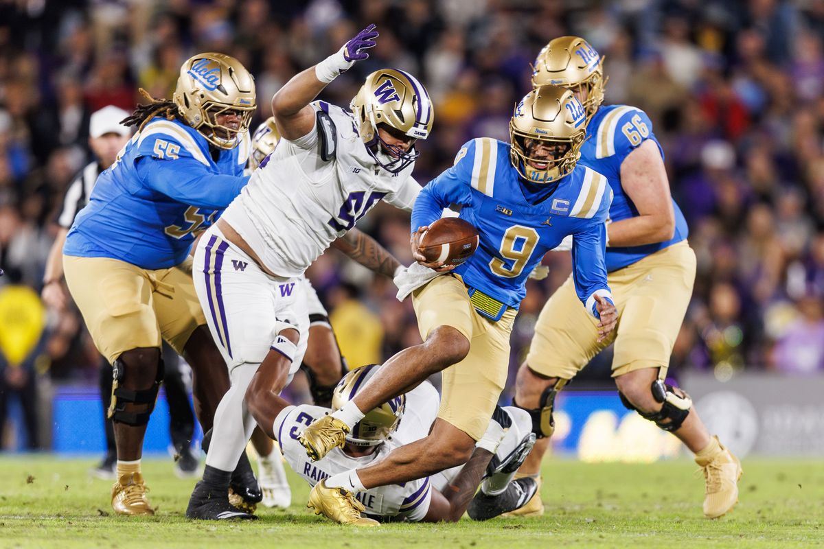 UCLA Bruins quarterback Nico Iamaleava (9) runs the ball during the game against Washington Huskies at Rose Bowl Stadium on November 22, 2025 in Pasadena, California. UCLA Bruins quarterback Nico Iamaleava (9) runs the ball during the game against Washington Huskies at Rose Bowl Stadium on November 22, 2025 in Pasadena, California.