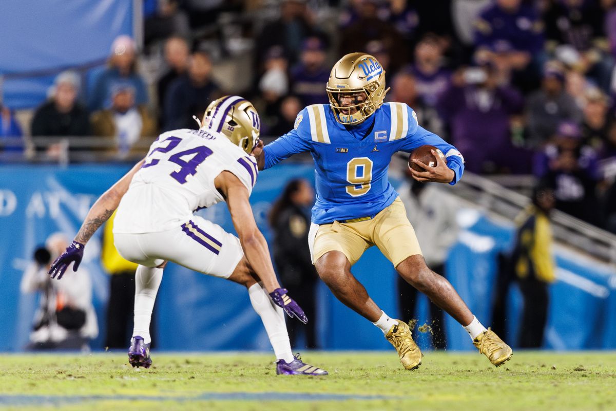 UCLA Bruins quarterback Nico Iamaleava (9) runs the ball during the game against Washington Huskies at Rose Bowl Stadium on November 22, 2025 in Pasadena, California. UCLA Bruins quarterback Nico Iamaleava (9) runs the ball during the game against Washington Huskies at Rose Bowl Stadium on November 22, 2025 in Pasadena, California.