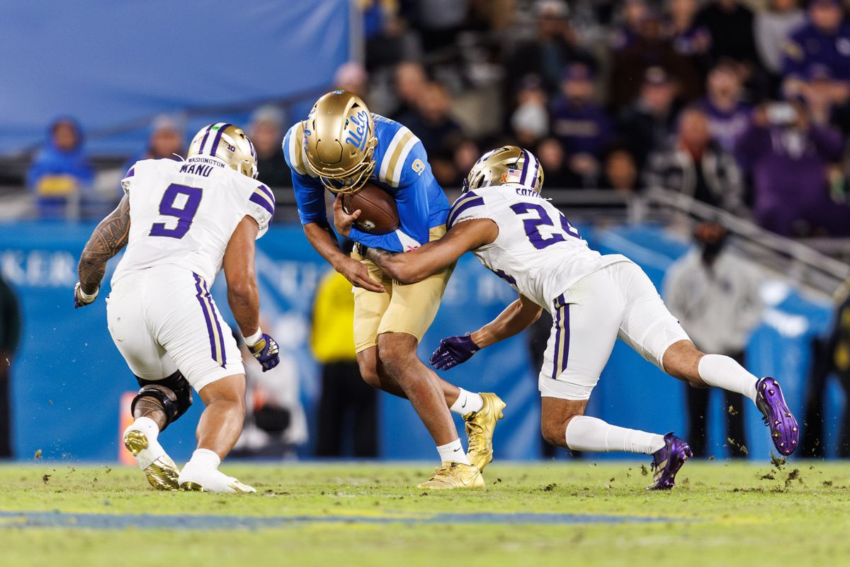 UCLA Bruins quarterback Nico Iamaleava (9) gets tackled during the game against Washington Huskies at Rose Bowl Stadium on November 22, 2025 in Pasadena, California. UCLA Bruins quarterback Nico Iamaleava (9) gets tackled during the game against Washington Huskies at Rose Bowl Stadium on November 22, 2025 in Pasadena, California.