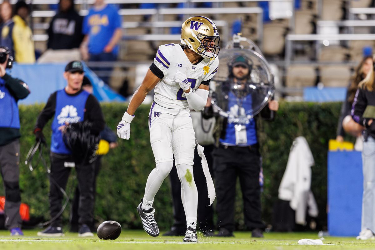 Washington Huskies wide receiver Chris Lawson (8) celebrates touchdown during the game against UCLA Bruins at Rose Bowl Stadium on November 22, 2025 in Pasadena, California. Washington Huskies wide receiver Chris Lawson (8) celebrates touchdown during the game against UCLA Bruins at Rose Bowl Stadium on November 22, 2025 in Pasadena, California.