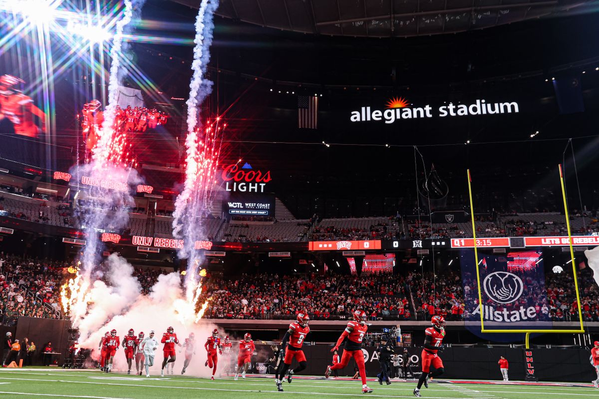 UNLV Rebels players run out for their game against the Hawai'i Rainbow Warriors on Friday November 21, 2025, in Las Vegas, Nevada. UNLV Rebels players run out for their game against the Hawai'i Rainbow Warriors on Friday November 21, 2025, in Las Vegas, Nevada.