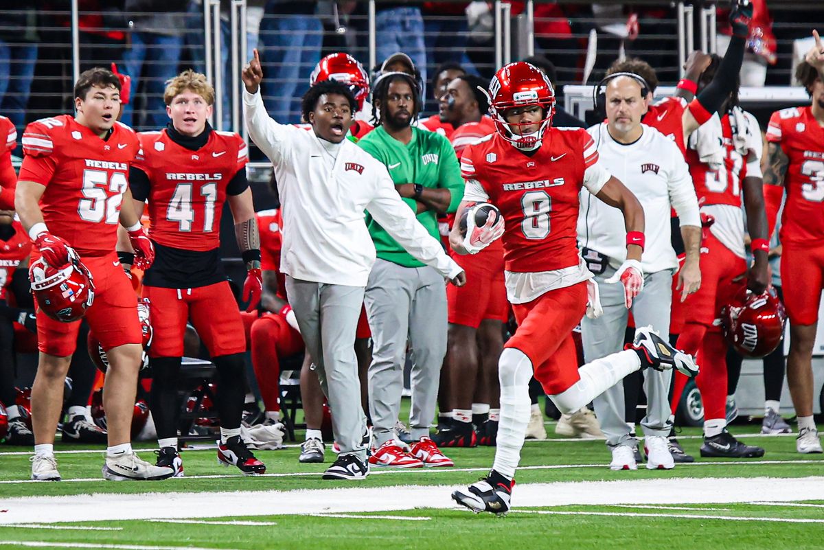 UNLV Rebels WR Taeshaun Lyons (8) runs past his sideline prior to scoring against the Hawai'i Rainbow Warriors on Friday November 21, 2025, in Las Vegas, Nevada. UNLV Rebels WR Taeshaun Lyons (8) runs past his sideline prior to scoring against the Hawai'i Rainbow Warriors on Friday November 21, 2025, in Las Vegas, Nevada.