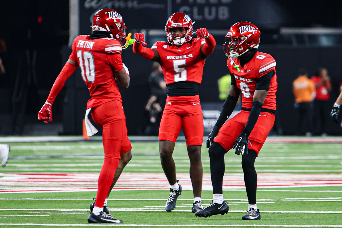 UNLV Rebels DB Tre Fulton (10), DB Quandarius Keyes (5), and DB Aamaris Brown (9) celebrate after an interception in a college football game against the Hawai'i Rainbow Warriors on Friday November 21, 2025, in Las Vegas, Nevada. UNLV Rebels DB Tre Fulton (10), DB Quandarius Keyes (5), and DB Aamaris Brown (9) celebrate after an interception in a college football game against the Hawai'i Rainbow Warriors on Friday November 21, 2025, in Las Vegas, Nevada.
