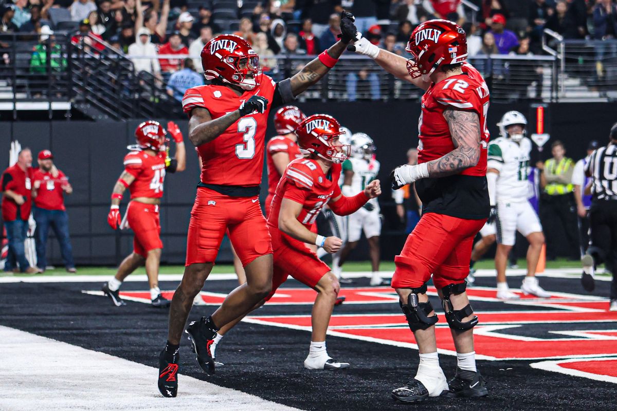 UNLV Rebels WR DaeDae Reynolds (3) and OL Will Thomas (72) celebrate after a touchdown during a college football game against the Hawai'i Rainbow Warriors on Friday November 21, 2025, in Las Vegas, Nevada. UNLV Rebels WR DaeDae Reynolds (3) and OL Will Thomas (72) celebrate after a touchdown during a college football game against the Hawai'i Rainbow Warriors on Friday November 21, 2025, in Las Vegas, Nevada.