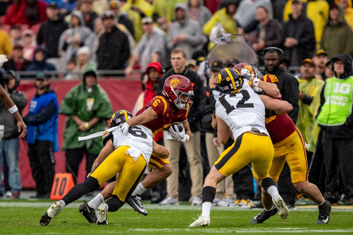 USC Trojans wide receiver, Makai Lemon (6) breaks a tackle during an NCAAF football game against the Iowa Hawkeyes on November 15, 2025 in Los Angeles, CA. USC Trojans wide receiver, Makai Lemon (6) breaks a tackle during an NCAAF football game against the Iowa Hawkeyes on November 15, 2025 in Los Angeles, CA.