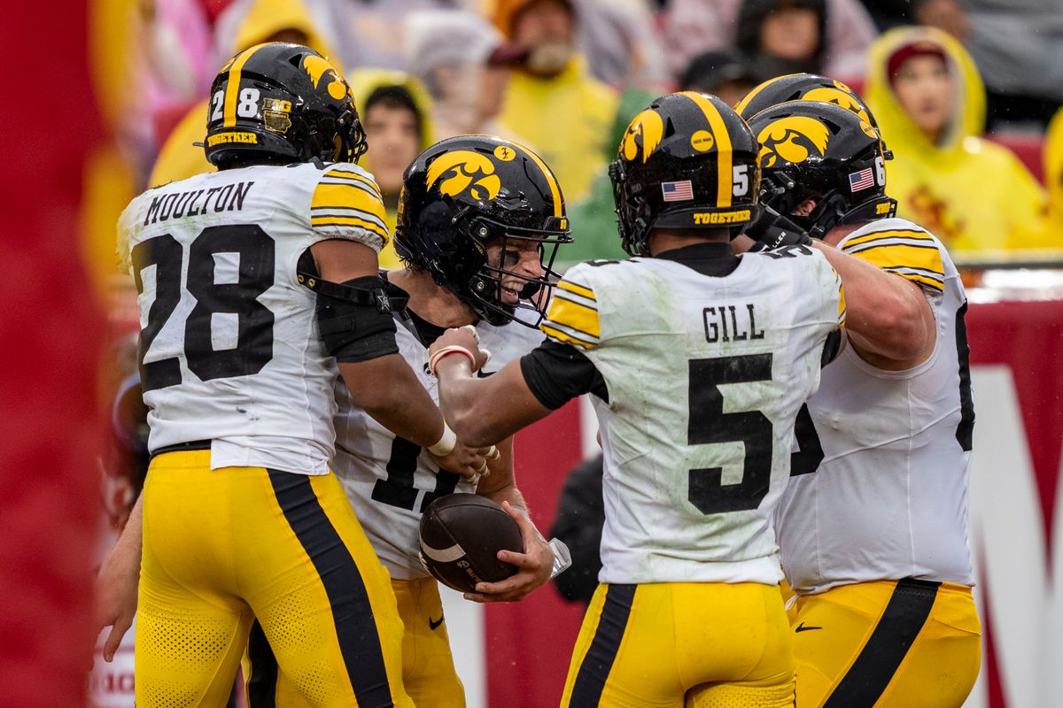 Iowa Hawkeyes quarterback, Mark Gronowski (11) celebrates a touchdown catch during an NCAAF football game against the USC Trojans on November 15, 2025 in Los Angeles, CA. Iowa Hawkeyes quarterback, Mark Gronowski (11) celebrates a touchdown catch during an NCAAF football game against the USC Trojans on November 15, 2025 in Los Angeles, CA.