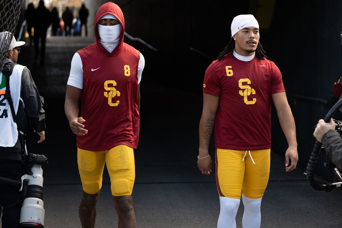 USC Trojans wide receivers, Makai Lemon (6) and Ja' Kobi Lane (8) walk out for warm ups during an NCAAF football game against the Oregon Ducks on November 22, 2025 in Eugene, OR. USC Trojans wide receivers, Makai Lemon (6) and Ja' Kobi Lane (8) walk out for warm ups during an NCAAF football game against the Oregon Ducks on November 22, 2025 in Eugene, OR.