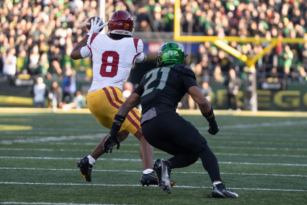 USC Trojans wide receiver, Ja' Kobi Lane (8) makes a catch in the middle of the field during an NCAAF football game against the Oregon Ducks on November 22, 2025 in Eugene, OR. USC Trojans wide receiver, Ja' Kobi Lane (8) makes a catch in the middle of the field during an NCAAF football game against the Oregon Ducks on November 22, 2025 in Eugene, OR.