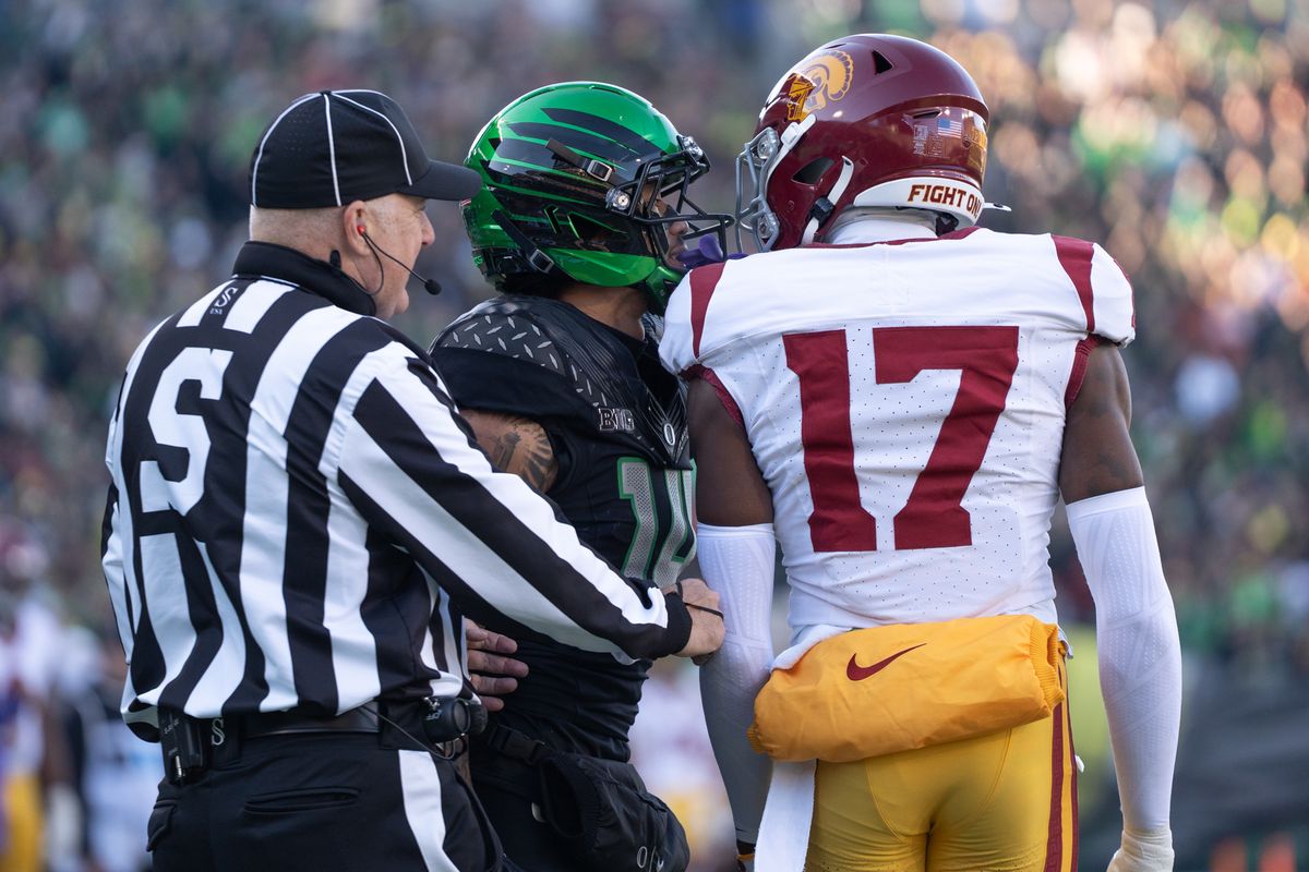 USC Trojans wide receiver, Prince Strachan (17) gets into the face of his defender during an NCAAF football game against the Oregon Ducks on November 22, 2025 in Eugene, OR. USC Trojans wide receiver, Prince Strachan (17) gets into the face of his defender during an NCAAF football game against the Oregon Ducks on November 22, 2025 in Eugene, OR.