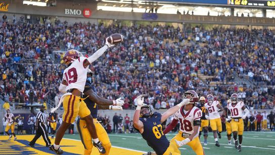 USC defeats Cal, 50-49, in a wild game (College)