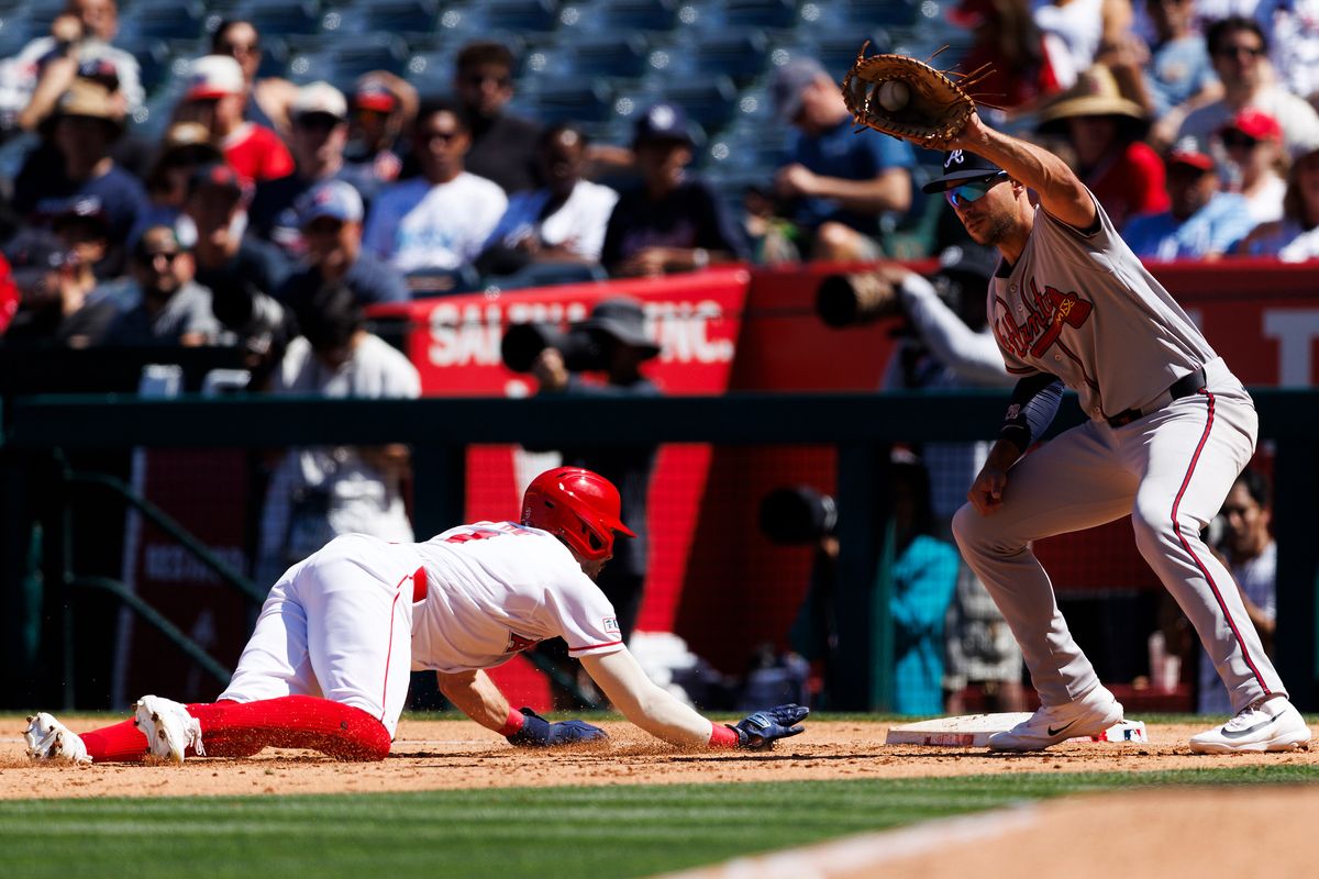 Zach Neto #9 of the Los Angeles Angels dives back to first base during the game against the Atlanta Braves at Angel Stadium of Anaheim on April 8, 2026 in Anaheim, California. Zach Neto #9 of the Los Angeles Angels dives back to first base during the game against the Atlanta Braves at Angel Stadium of Anaheim on April 8, 2026 in Anaheim, California.