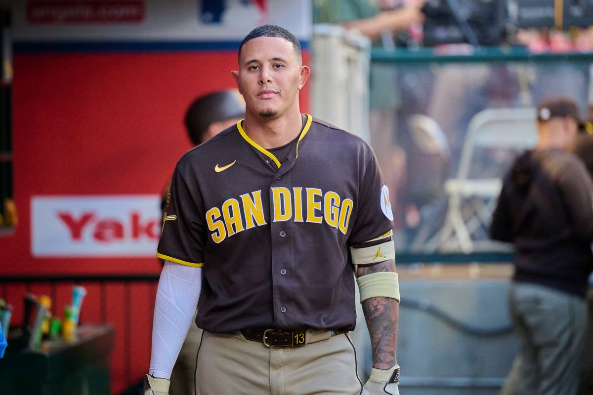 The San Diego Padres Manny Machado #13 in the dugout during an MLB game against the Los Angeles Angels, April 18th, 2026 in Anaheim California. The San Diego Padres Manny Machado #13 in the dugout during an MLB game against the Los Angeles Angels, April 18th, 2026 in Anaheim California.