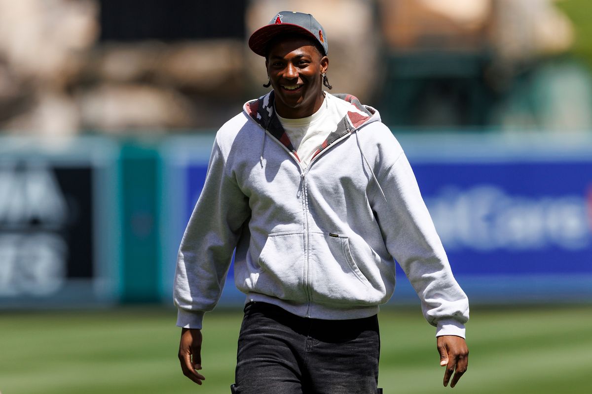 King Miller of the USC Trojans celebrates after throwing out the first pitch before the game between the San Diego Padres and the Los Angeles Angels at Angel Stadium of Anaheim on April 19, 2026 in Anaheim, California. King Miller of the USC Trojans celebrates after throwing out the first pitch before the game between the San Diego Padres and the Los Angeles Angels at Angel Stadium of Anaheim on April 19, 2026 in Anaheim, California.