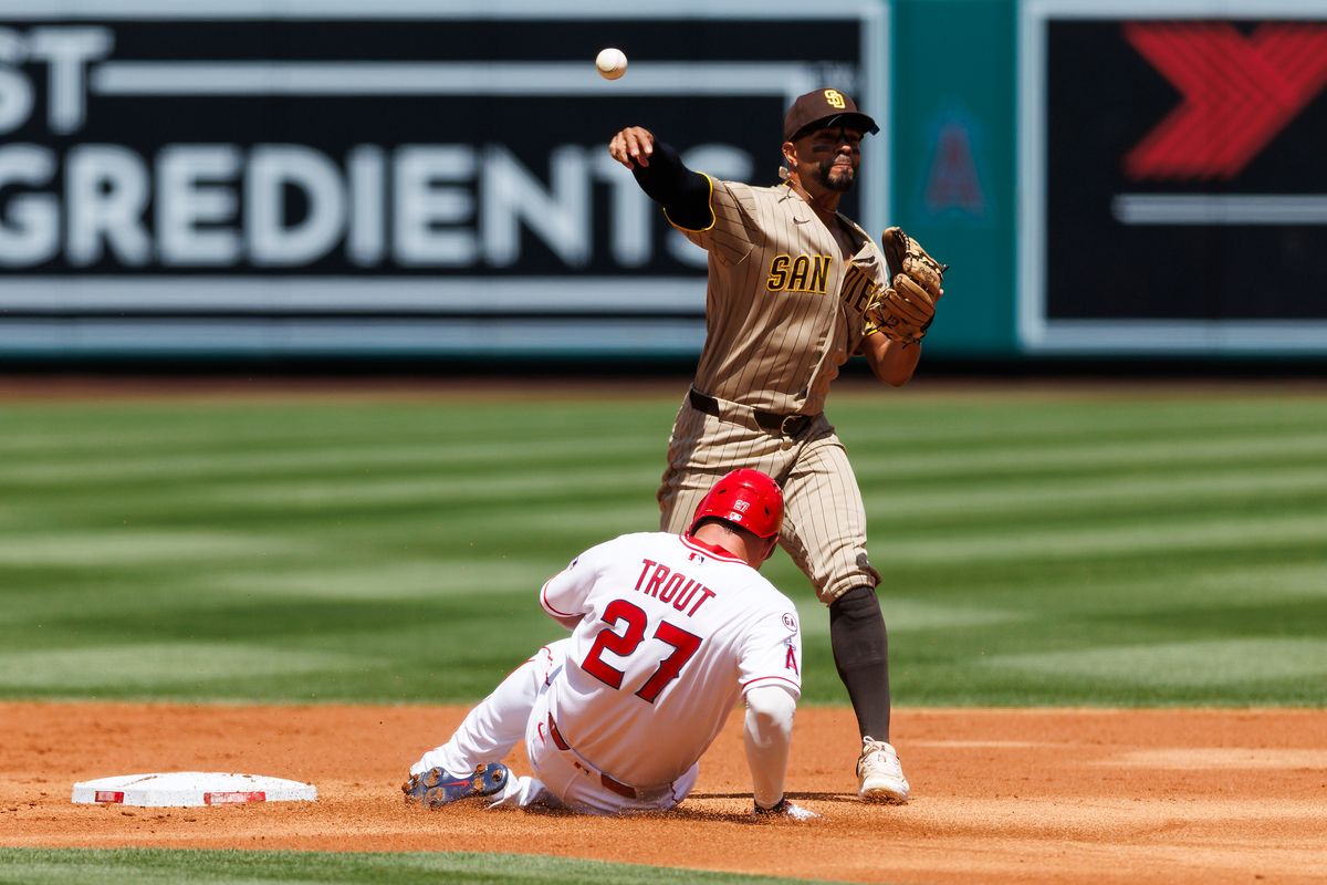 Mike Trout #27 of the Los Angeles Angels slides into second base against Xander Bogaerts #2 of the San Diego Padres during the game at Angel Stadium of Anaheim on April 19, 2026 in Anaheim, California. Mike Trout #27 of the Los Angeles Angels slides into second base against Xander Bogaerts #2 of the San Diego Padres during the game at Angel Stadium of Anaheim on April 19, 2026 in Anaheim, California.