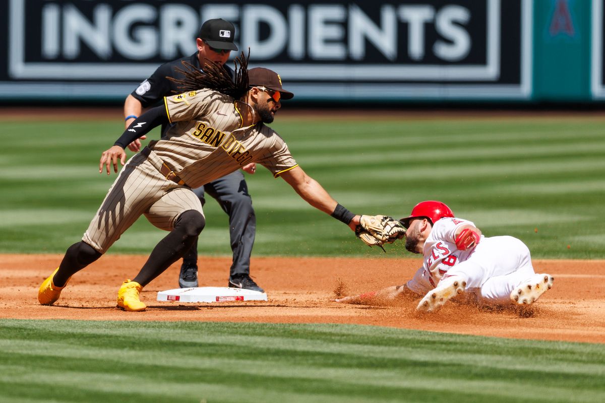 Nolan Schanuel #18 of the Los Angeles Angels slides into second base against Fernando Tatis Jr. #23 of the San Diego Padres during the game at Angel Stadium of Anaheim on April 19, 2026 in Anaheim, California. Nolan Schanuel #18 of the Los Angeles Angels slides into second base against Fernando Tatis Jr. #23 of the San Diego Padres during the game at Angel Stadium of Anaheim on April 19, 2026 in Anaheim, California.
