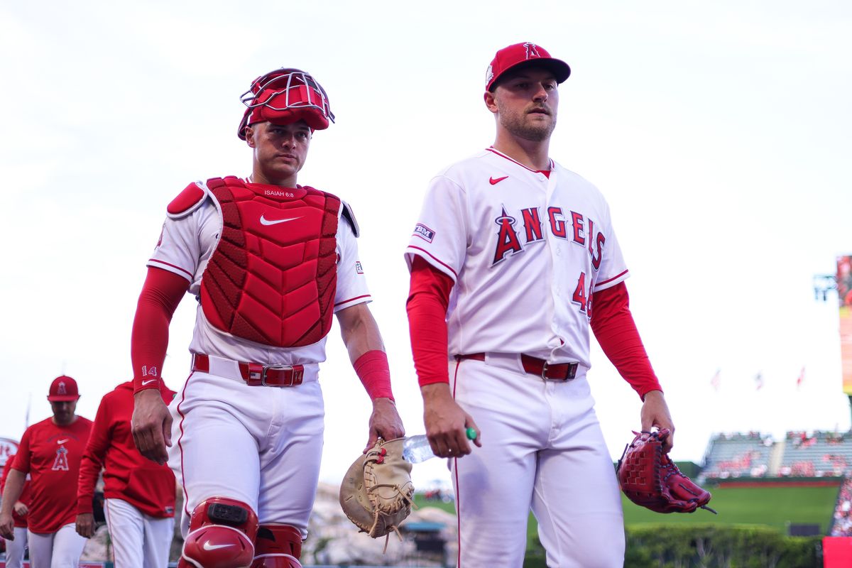 Los Angeles Angels catcher Logan O'Hoppe (14) and left handed pitcher Reid Detmers (48) walk into the dugout before the MLB game against the Toronto Blue Jays Monday April 20th, 2026 at Angel's Stadium in Anaheim, Calif. Los Angeles Angels catcher Logan O'Hoppe (14) and left handed pitcher Reid Detmers (48) walk into the dugout before the MLB game against the Toronto Blue Jays Monday April 20th, 2026 at Angel's Stadium in Anaheim, Calif.
