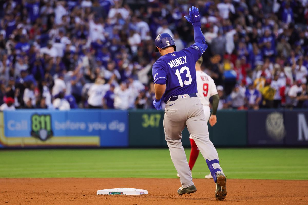 Los Angeles Dodgers infielder Max Muncy (13) celebrates during the MLB game against the Los Angeles Angels Friday May 15th, 2026 at Angel's Stadium in Anaheim, Calif. Los Angeles Dodgers infielder Max Muncy (13) celebrates during the MLB game against the Los Angeles Angels Friday May 15th, 2026 at Angel's Stadium in Anaheim, Calif.