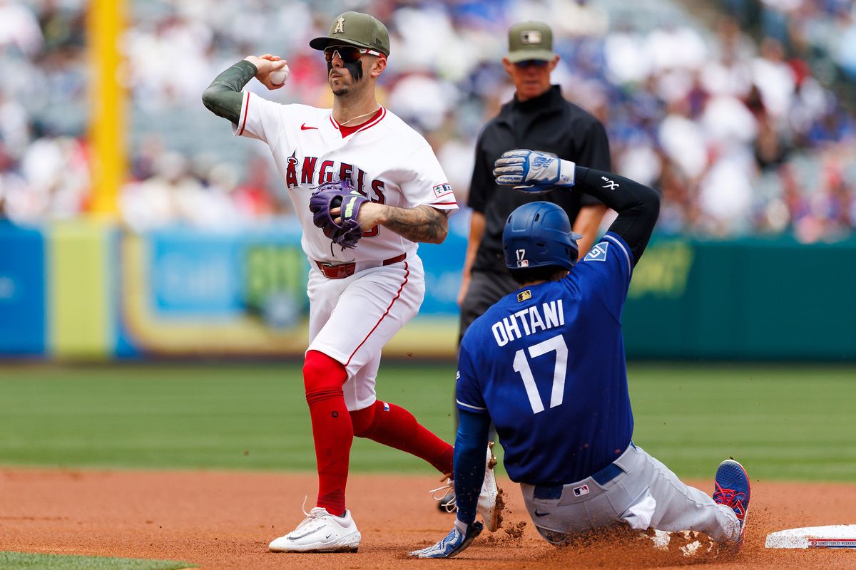 Shohei Ohtani #17 of the Los Angeles Dodgers slides into second base against Zach Neto #9 of the Los Angeles Angels during the game at Angel Stadium of Anaheim on May 17, 2026 in Anaheim, California. Shohei Ohtani #17 of the Los Angeles Dodgers slides into second base against Zach Neto #9 of the Los Angeles Angels during the game at Angel Stadium of Anaheim on May 17, 2026 in Anaheim, California.