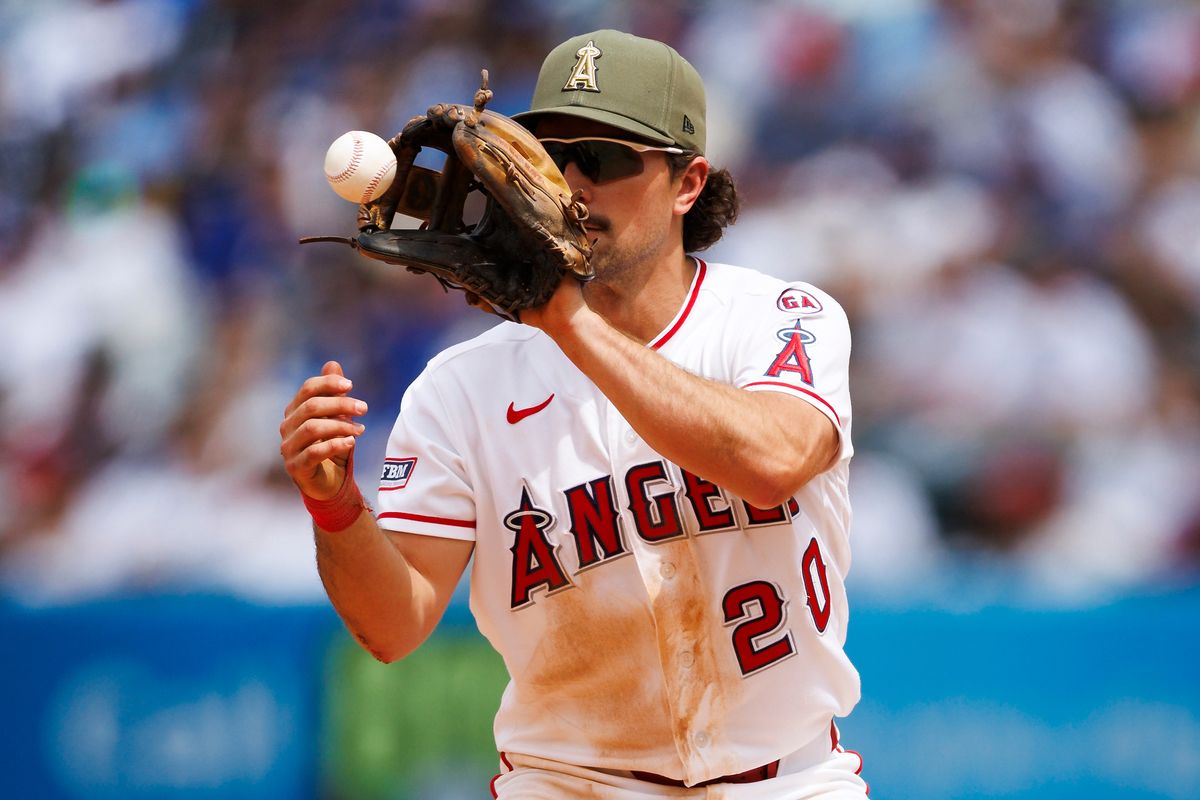 Adam Frazier #20 of the Los Angeles Angels catches a ball at second base during the game against the Los Angeles Dodgers at Angel Stadium of Anaheim on May 17, 2026 in Anaheim, California. Adam Frazier #20 of the Los Angeles Angels catches a ball at second base during the game against the Los Angeles Dodgers at Angel Stadium of Anaheim on May 17, 2026 in Anaheim, California.