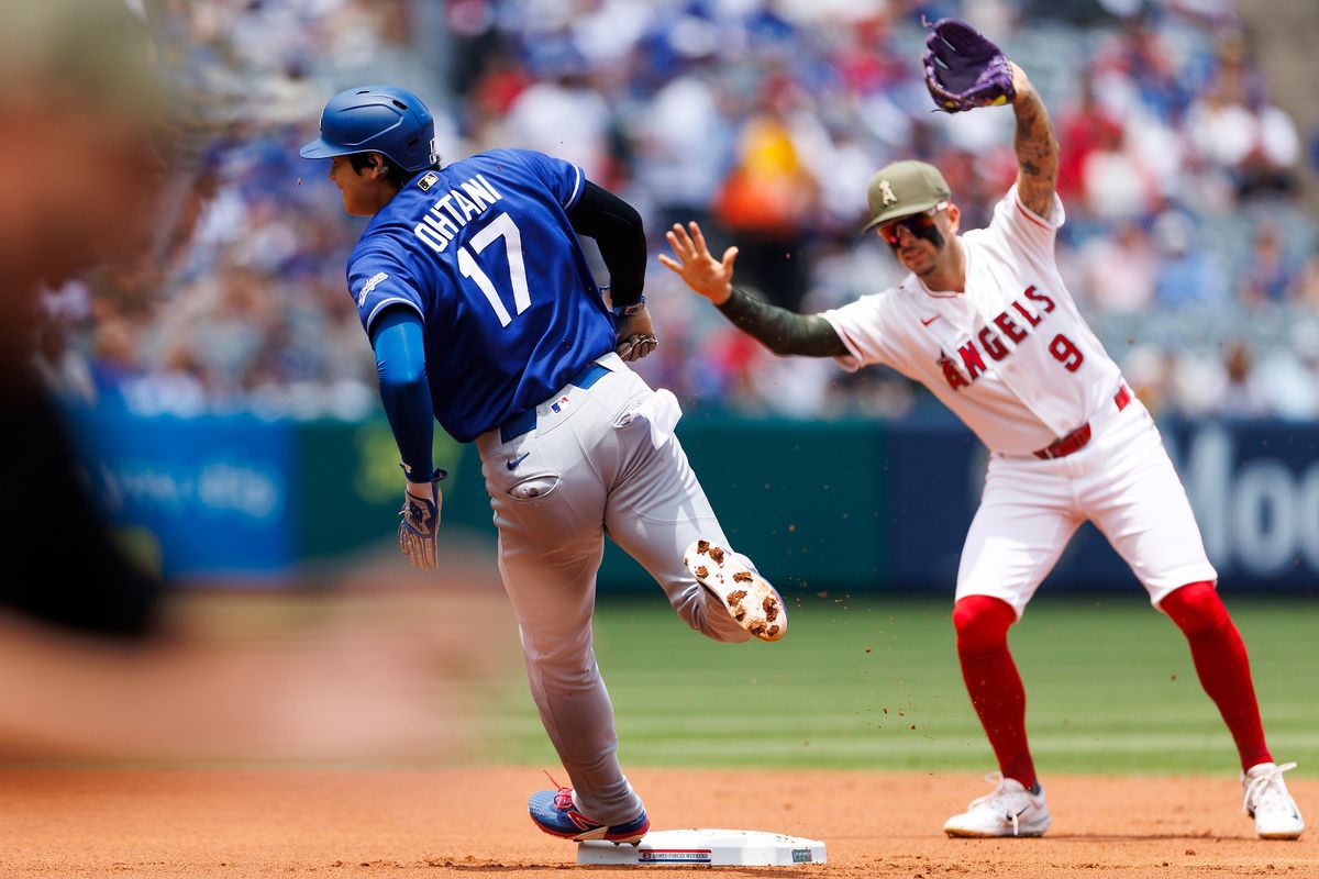 Zach Neto #9 of the Los Angeles Angels signals to Shohei Ohtani #17 of the Los Angeles Dodgers to stop after a foul ball during the game at Angel Stadium of Anaheim on May 17, 2026 in Anaheim, California. Zach Neto #9 of the Los Angeles Angels signals to Shohei Ohtani #17 of the Los Angeles Dodgers to stop after a foul ball during the game at Angel Stadium of Anaheim on May 17, 2026 in Anaheim, California.
