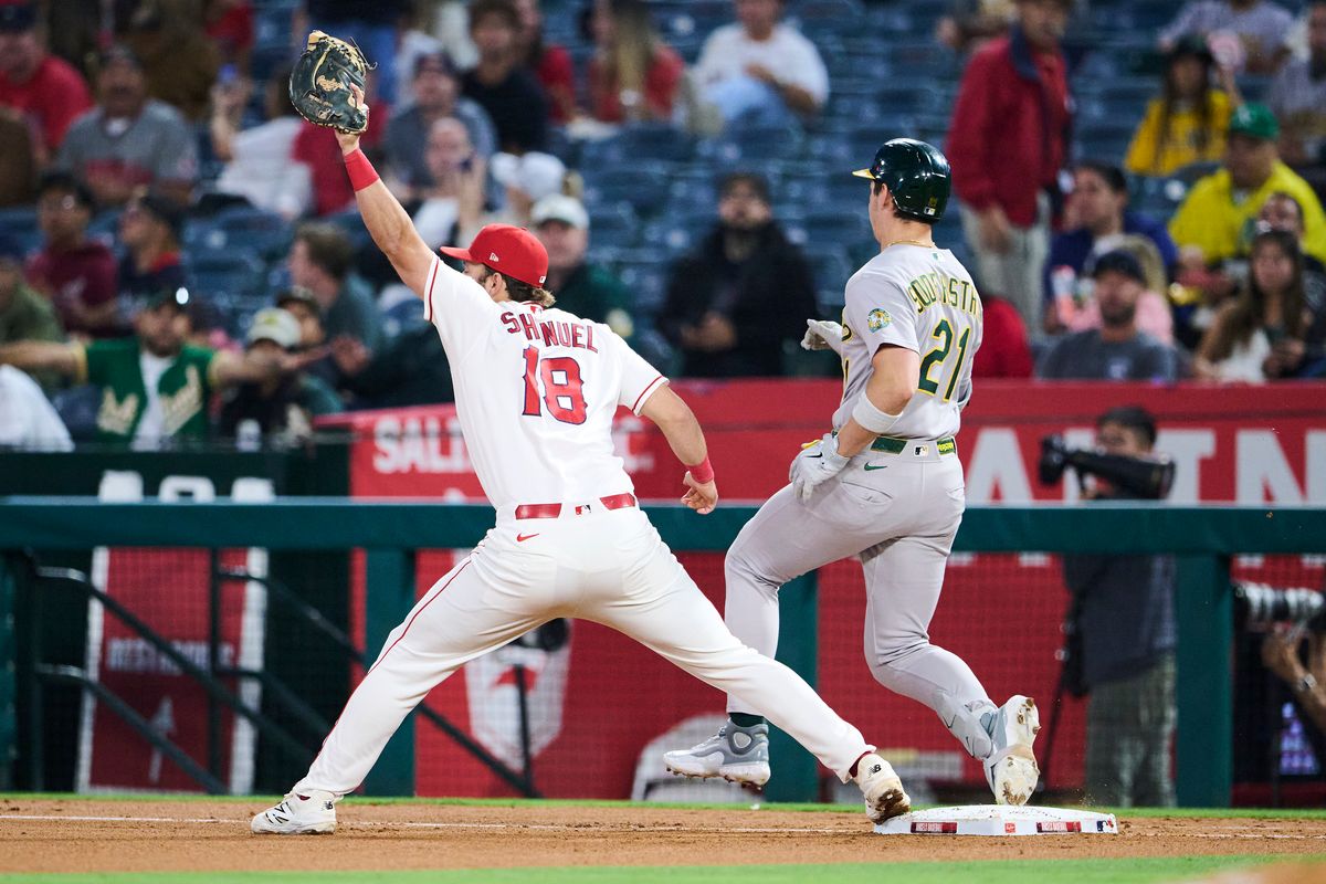 The Los Angeles Angels Nolan Schanuel #18 catches at first base during an MLB game against The Athletics on May 21st, 2026 at Angels Stadium in Anaheim, California. The Los Angeles Angels Nolan Schanuel #18 catches at first base during an MLB game against The Athletics on May 21st, 2026 at Angels Stadium in Anaheim, California.