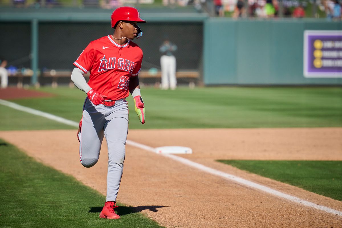 The Los Angeles Angels infielder Denzer Guzman (23) scores a run against The Arizona Diamondbacks ,February 22nd, 2026 in Scottsdale Arizona.