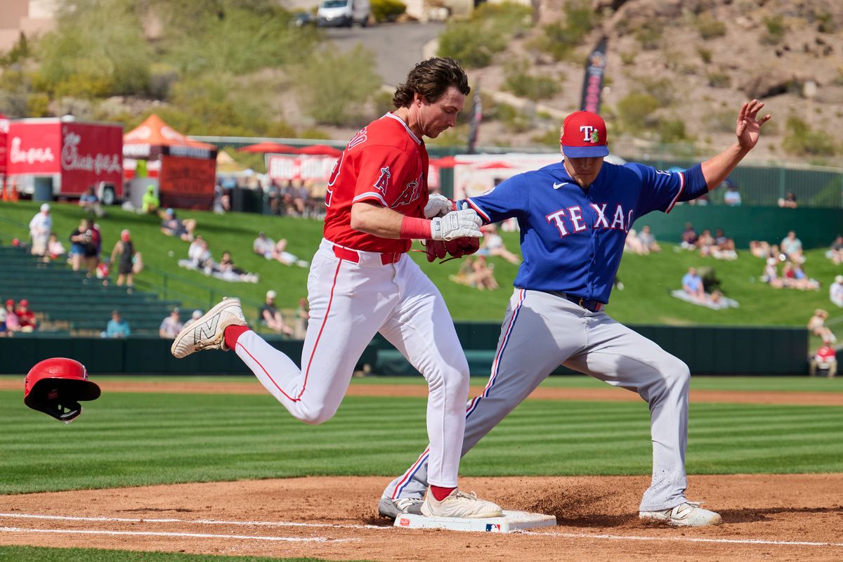 The Los Angeles Angels right fielder Bryce Teodosio (22) runs to first against The Texas Rangers ,February 23rd, 2026 in Tempe Arizona. The Los Angeles Angels right fielder Bryce Teodosio (22) runs to first against The Texas Rangers ,February 23rd, 2026 in Tempe Arizona.