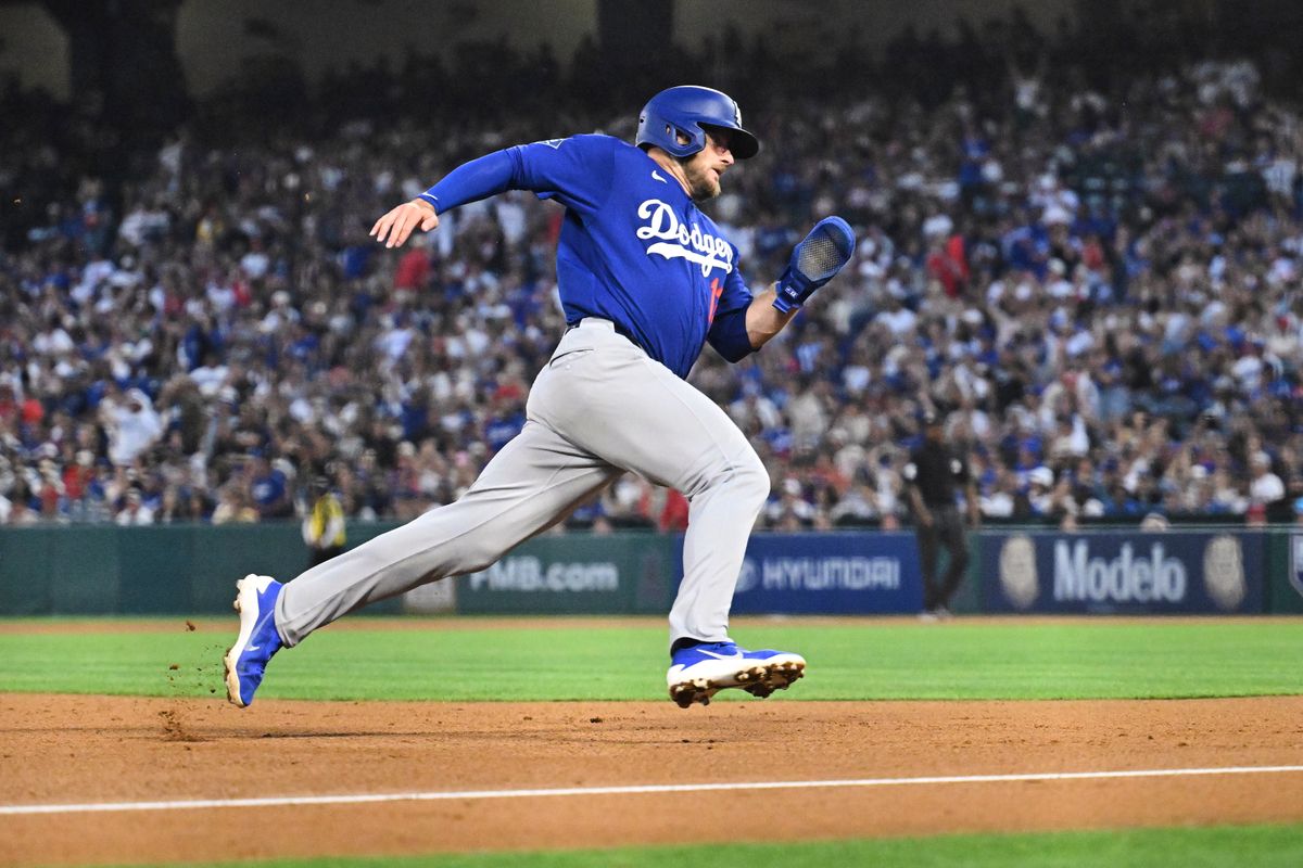 The Los Angeles Dodgers third baseman Max Muncy (13) rounds third during a Spring Training Game against The Los Angeles Angels, March 22nd, 2026 in Anaheim, California. The Los Angeles Dodgers third baseman Max Muncy (13) rounds third during a Spring Training Game against The Los Angeles Angels, March 22nd, 2026 in Anaheim, California.