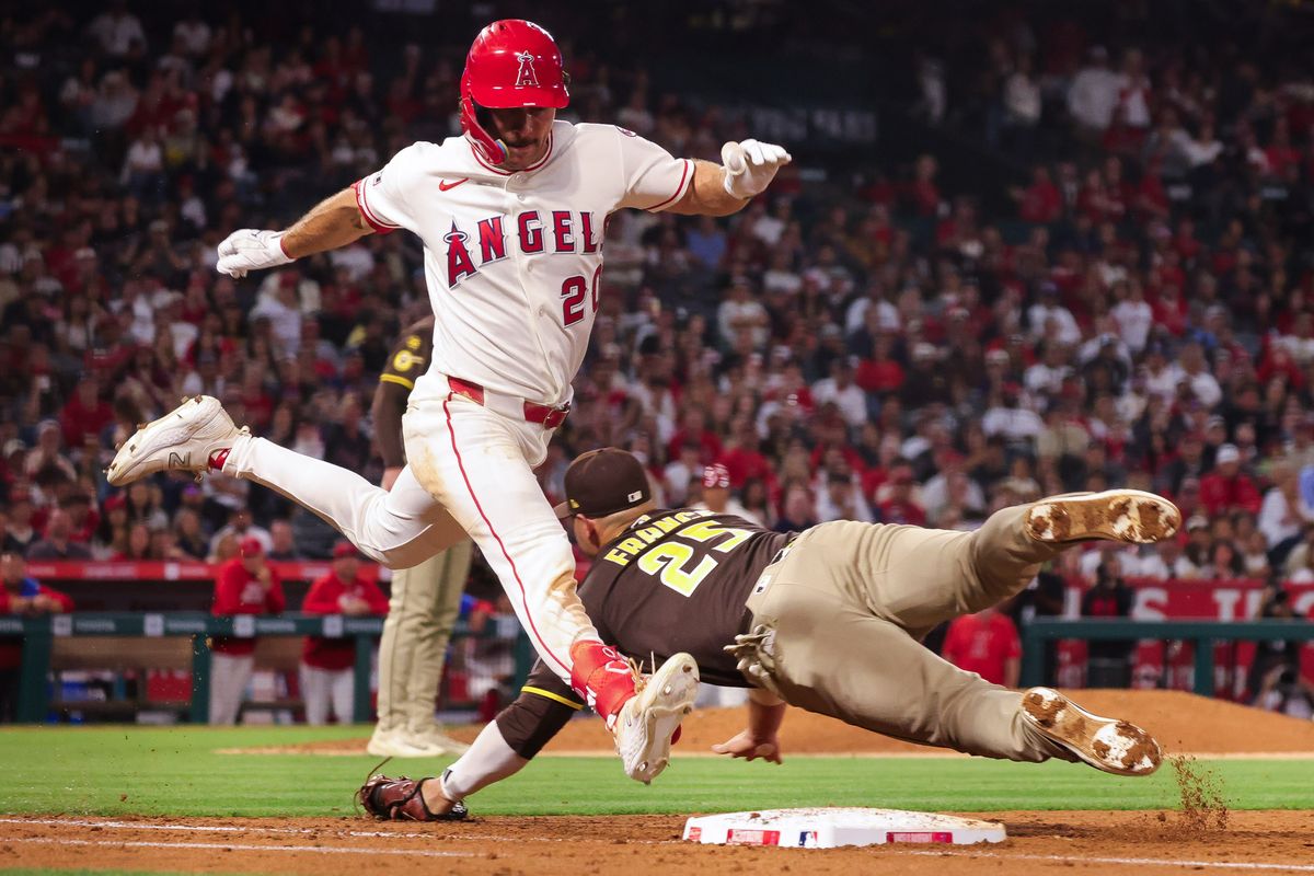 Los Angeles Angels infielder Adam Frazier (20) leaps to first base during the MLB game against the San Diego Padres Friday April 17th, 2026 at Angel's Stadium in Anaheim, Calif. Los Angeles Angels infielder Adam Frazier (20) leaps to first base during the MLB game against the San Diego Padres Friday April 17th, 2026 at Angel's Stadium in Anaheim, Calif.