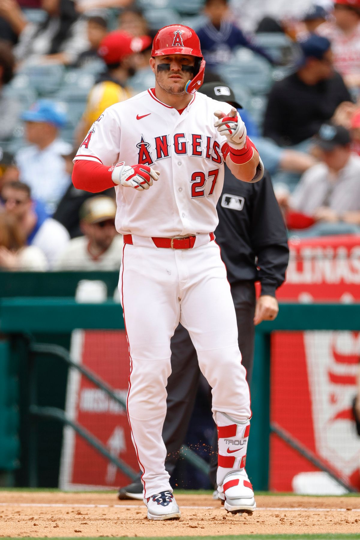 Mike Trout #27 of the Los Angeles Angels celebrates after hitting a single against the New York Mets at Angel Stadium on May 3, 2026, in Anaheim, California. Mike Trout #27 of the Los Angeles Angels celebrates after hitting a single against the New York Mets at Angel Stadium on May 3, 2026, in Anaheim, California.