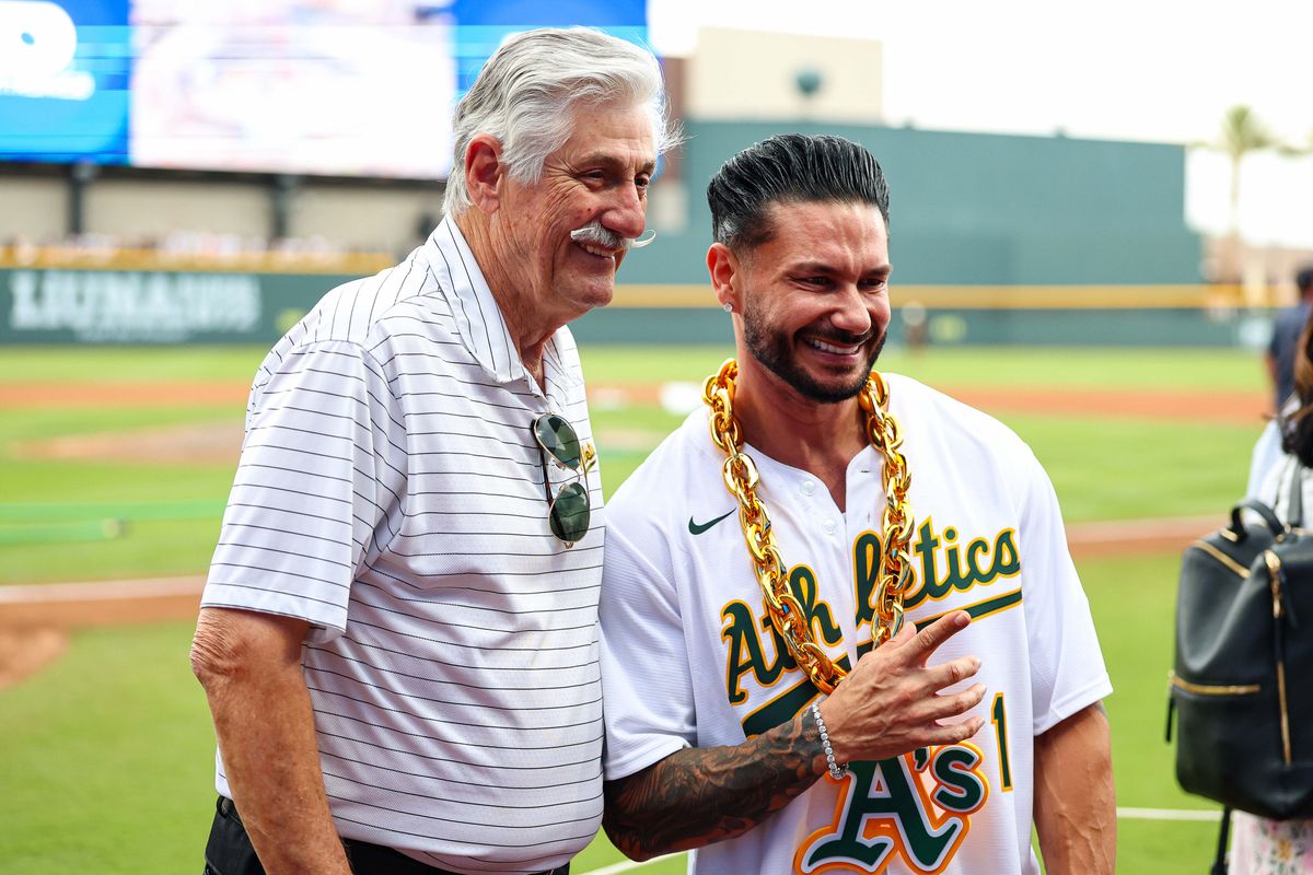 Hall of Fame former RHP Rollie Fingers poses for a photo with DJ Pauly D prior to an MLB baseball game between the Athletics and Milwaukee Brewers at the Las Vegas Ballpark on Monday June 8, 2026, in Las Vegas, Nevada. Hall of Fame former RHP Rollie Fingers poses for a photo with DJ Pauly D prior to an MLB baseball game between the Athletics and Milwaukee Brewers at the Las Vegas Ballpark on Monday June 8, 2026, in Las Vegas, Nevada.