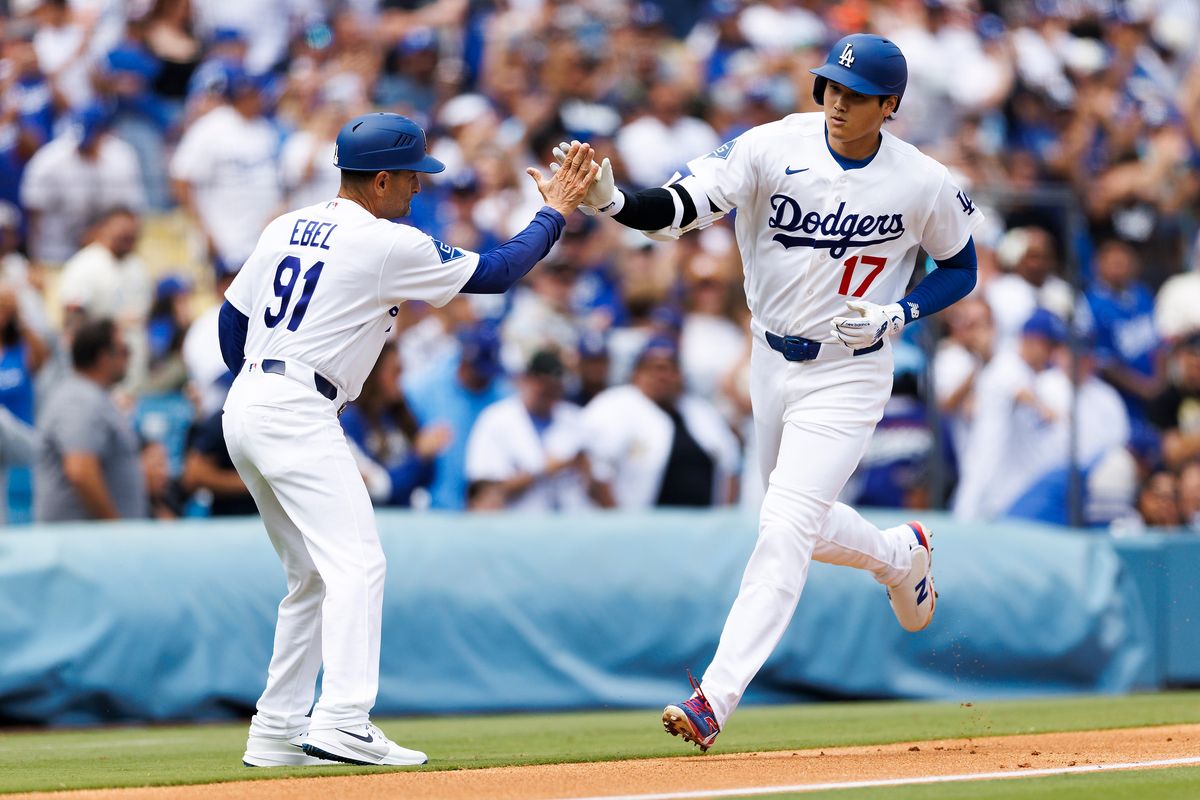 Shohei Ohtani #17 of the Los Angeles Dodgers celebrates his home run during the game against the Texas Rangers at Dodger Stadium on April 12, 2026 in Los Angeles, California. Shohei Ohtani #17 of the Los Angeles Dodgers celebrates his home run during the game against the Texas Rangers at Dodger Stadium on April 12, 2026 in Los Angeles, California.