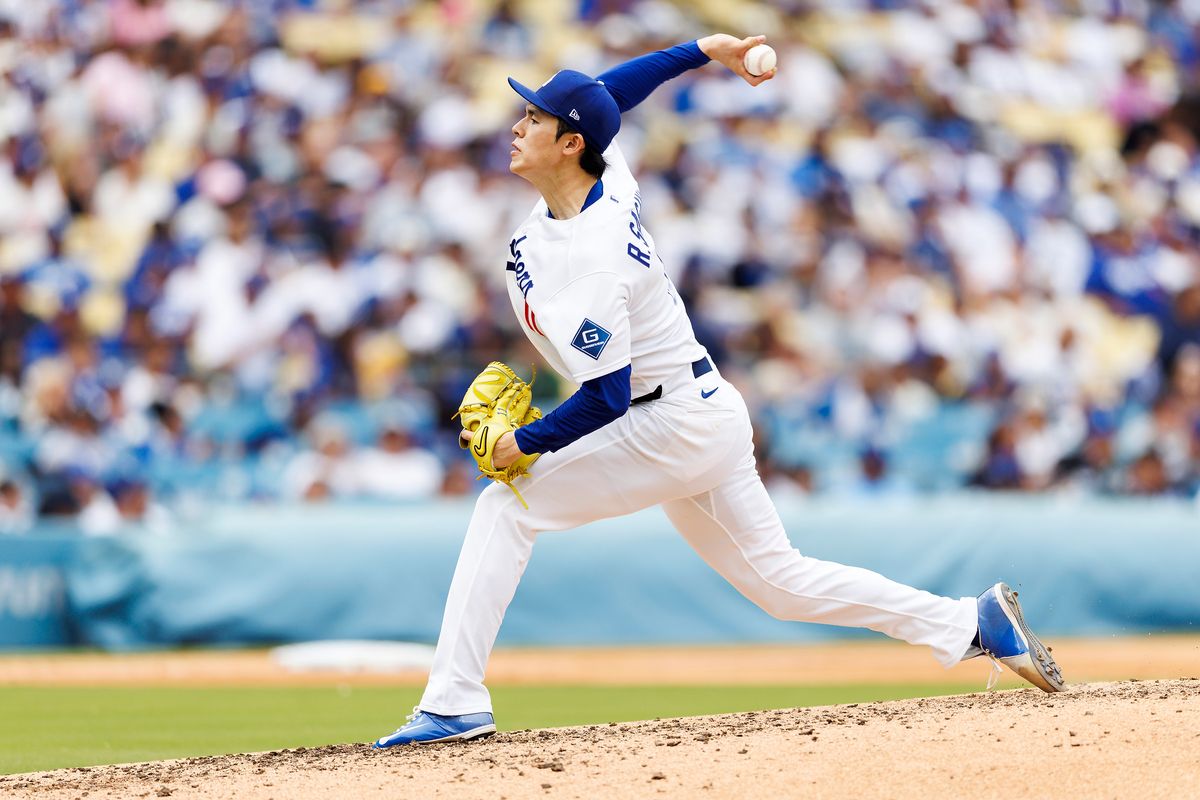 Roki Sasaki #11 of the Los Angeles Dodgers pitches during the game against the Texas Rangers at Dodger Stadium on April 12, 2026 in Los Angeles, California. Roki Sasaki #11 of the Los Angeles Dodgers pitches during the game against the Texas Rangers at Dodger Stadium on April 12, 2026 in Los Angeles, California.