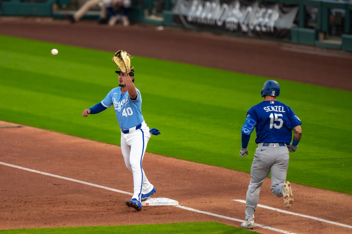 Kansas City Royals first baseman Josh Rojas (40) tagging first while catching the ball during an MLB spring training baseball game against the Los Angeles Dodgers on March 17th, 2026 in Surprise, AZ. Kansas City Royals first baseman Josh Rojas (40) tagging first while catching the ball during an MLB spring training baseball game against the Los Angeles Dodgers on March 17th, 2026 in Surprise, AZ.
