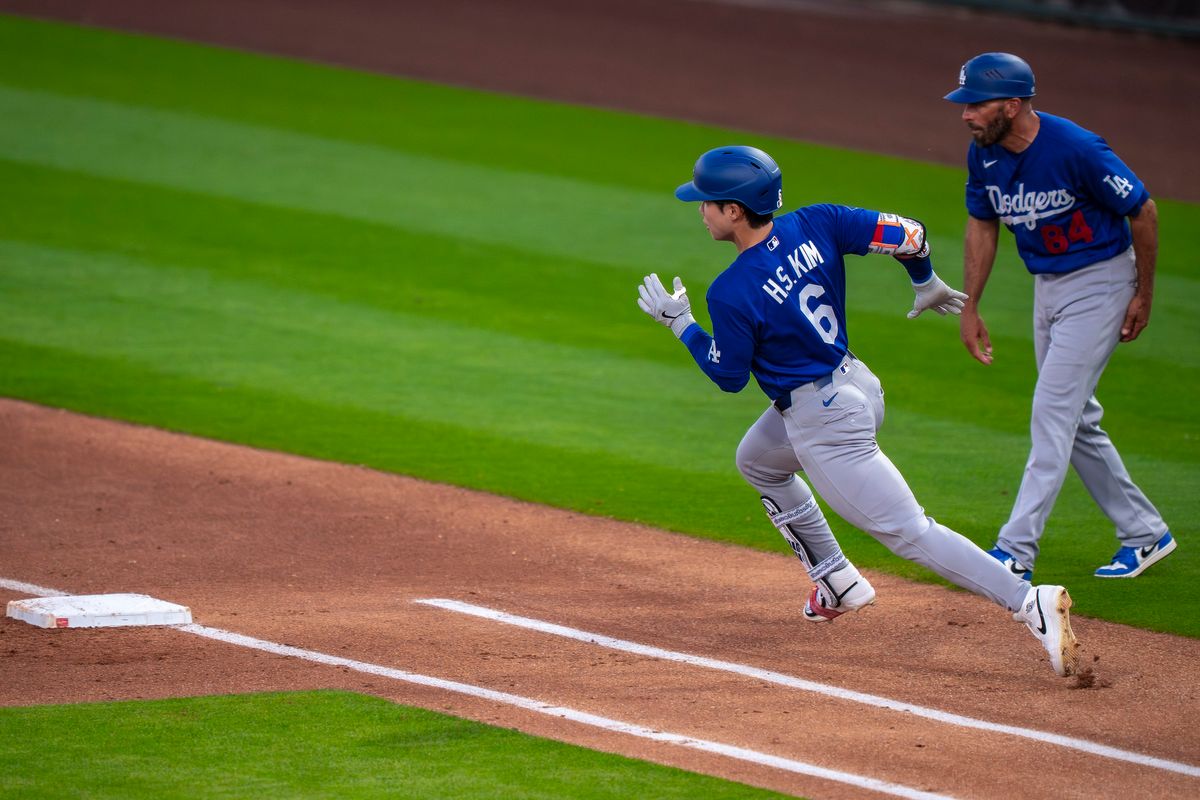 Los Angeles Dodgers shortstop Hyeseon Kim (6) rounding first base after a hit during an MLB spring training baseball game against the Kansas City Royals on March 17th, 2026 in Surprise, AZ. Los Angeles Dodgers shortstop Hyeseon Kim (6) rounding first base after a hit during an MLB spring training baseball game against the Kansas City Royals on March 17th, 2026 in Surprise, AZ.