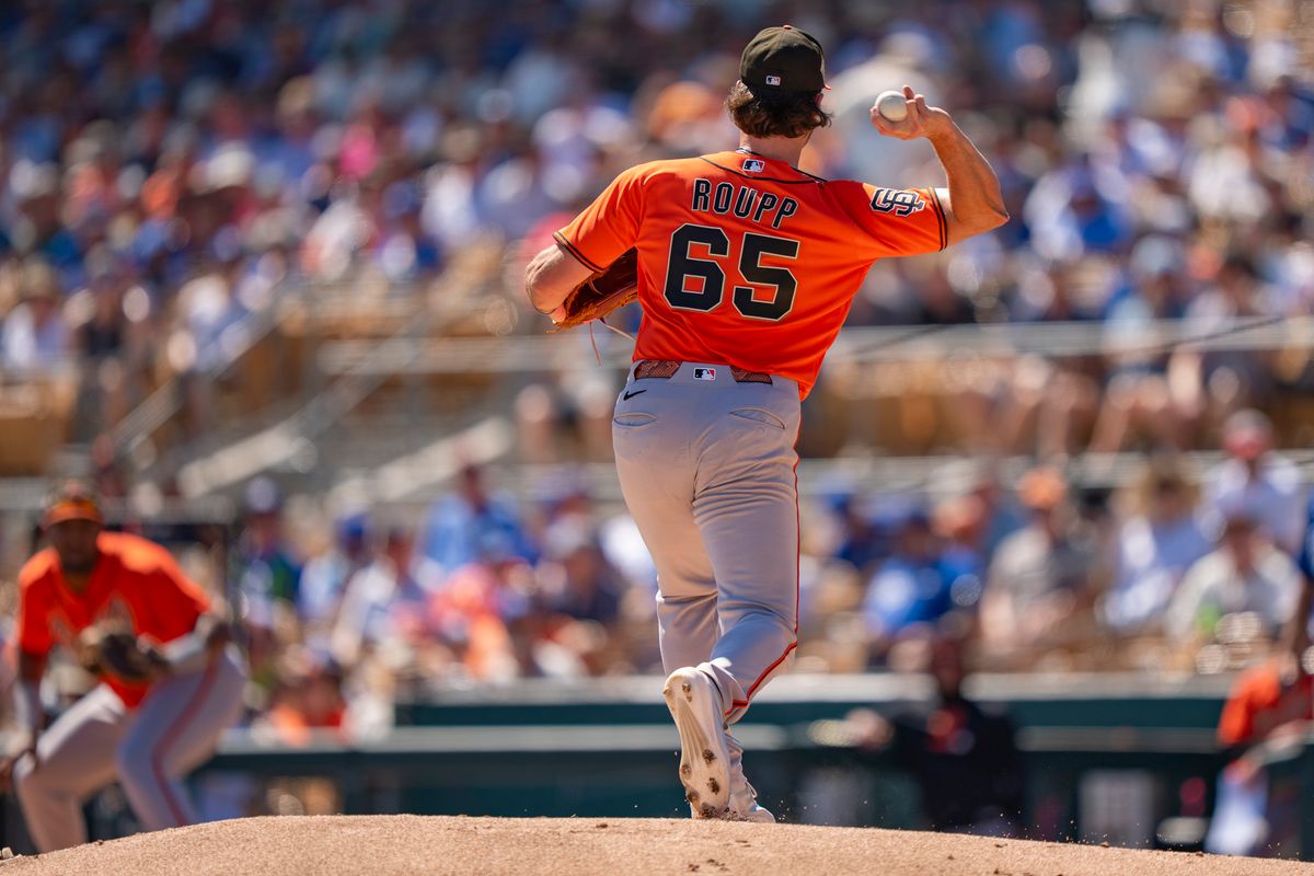 San Francisco Giants pitcher Landen Roupp (65) throwing to first during an MLB spring training baseball game against the Los Angeles Dodgers on March 18th, 2026 in Glendale, AZ. San Francisco Giants pitcher Landen Roupp (65) throwing to first during an MLB spring training baseball game against the Los Angeles Dodgers on March 18th, 2026 in Glendale, AZ.