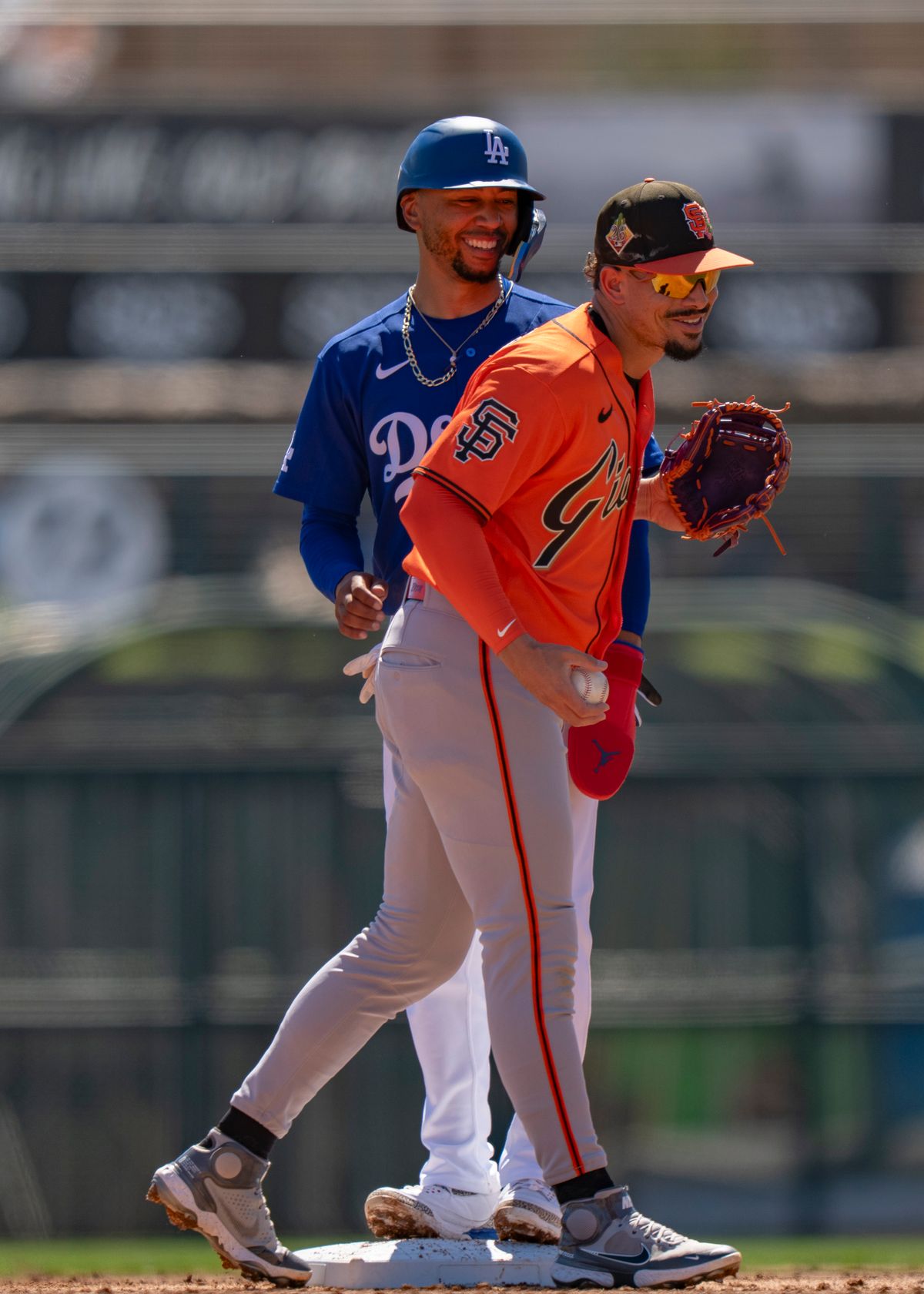 San Francisco Giants shortstop Willy Adames (2) laughing with Mookie Betts during an MLB spring training baseball game against the Los Angeles Dodgers on March 18th, 2026 in Glendale, AZ. San Francisco Giants shortstop Willy Adames (2) laughing with Mookie Betts during an MLB spring training baseball game against the Los Angeles Dodgers on March 18th, 2026 in Glendale, AZ.