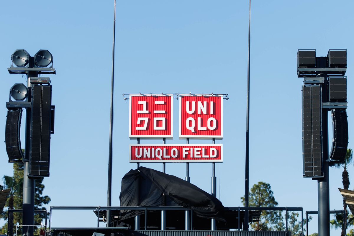 The UNIQLO Field signage is revealed in center field during a UNIQLO partnership press conference on March 25, 2026 in Los Angeles, California. The UNIQLO Field signage is revealed in center field during a UNIQLO partnership press conference on March 25, 2026 in Los Angeles, California.