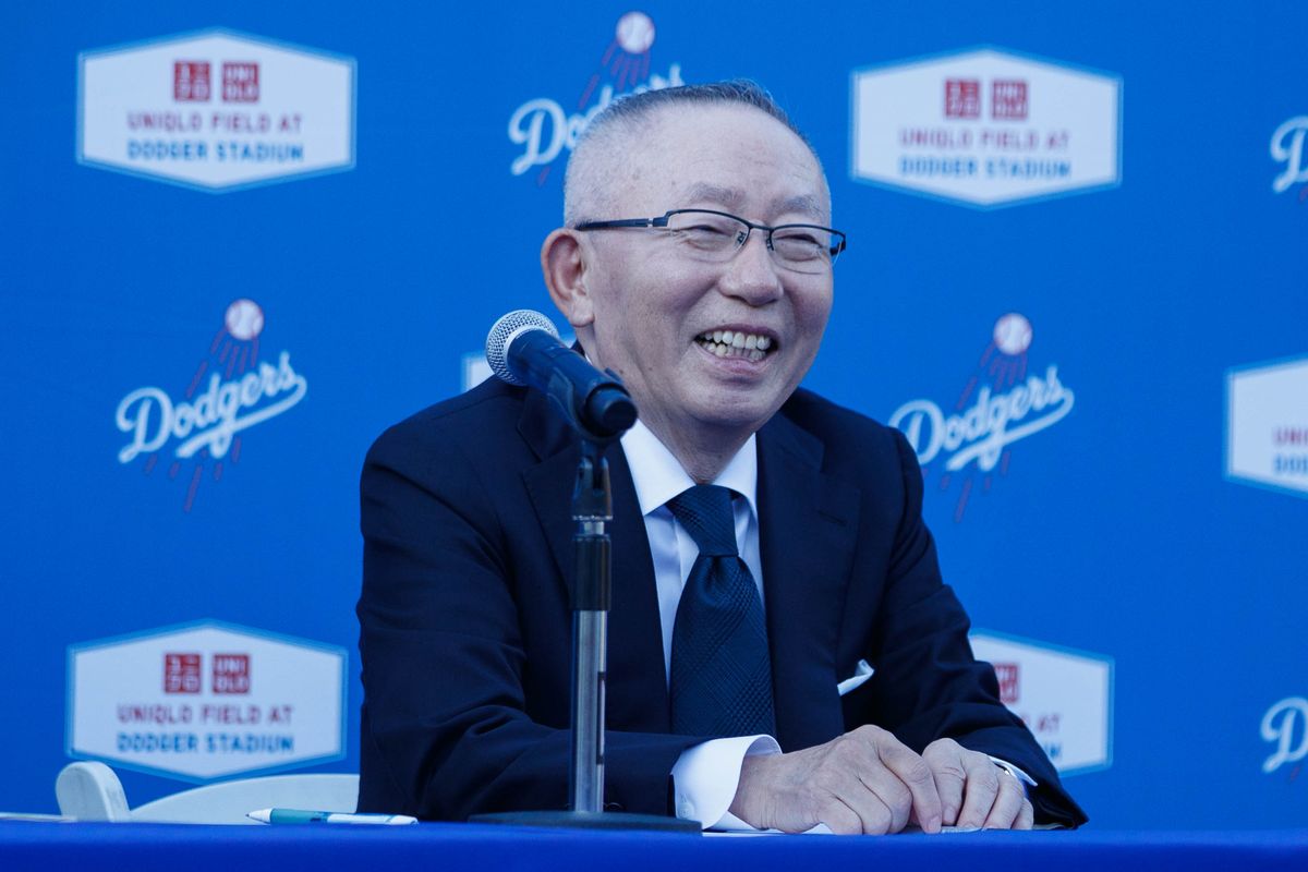 UNQILO founder Tadashi Yanai laughs during a UNIQLO partnership press conference on March 25, 2026 in Los Angeles, California. UNQILO founder Tadashi Yanai laughs during a UNIQLO partnership press conference on March 25, 2026 in Los Angeles, California.