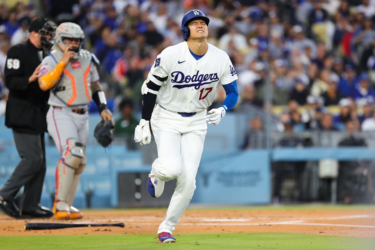 Shohei Ohtani #17 of the Los Angeles Dodgers runs to first base after being hit by a pitch during an MLB game against the New York Mets on April 13, 2026 in Los Angeles, CA. Shohei Ohtani #17 of the Los Angeles Dodgers runs to first base after being hit by a pitch during an MLB game against the New York Mets on April 13, 2026 in Los Angeles, CA.