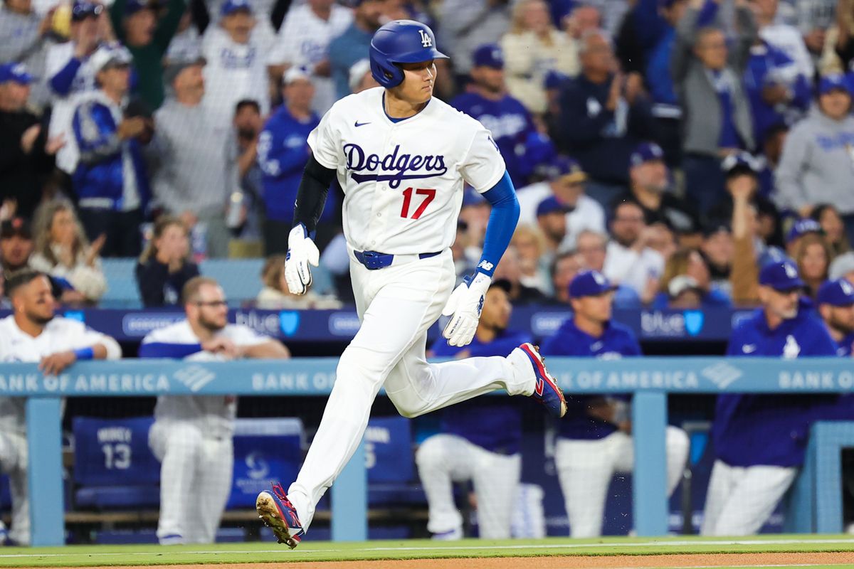 Shohei Ohtani #17 of the Los Angeles Dodgers runs to home plate during an MLB game against the New York Mets on April 13, 2026 in Los Angeles, CA. Shohei Ohtani #17 of the Los Angeles Dodgers runs to home plate during an MLB game against the New York Mets on April 13, 2026 in Los Angeles, CA.
