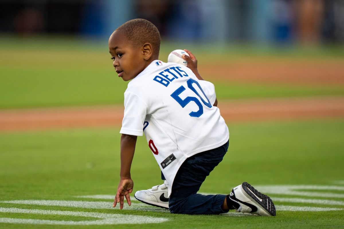 Los Angeles Dodgers infielder Mookie Betts' (50) son warming up for first pitch before an MLB baseball game against the Baltimore Orioles on June 19th, 2026 in Los Angeles, CA. Los Angeles Dodgers infielder Mookie Betts' (50) son warming up for first pitch before an MLB baseball game against the Baltimore Orioles on June 19th, 2026 in Los Angeles, CA.